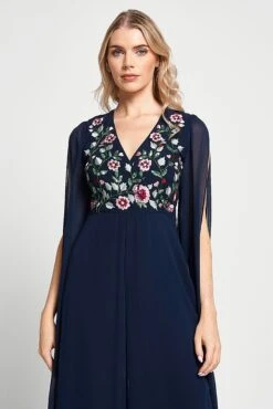 Rue Navy Floral Embroidered Cape Sleeve Jumpsuit -Frock And Frill US Rue Navy Floral Jumpsuit . 1